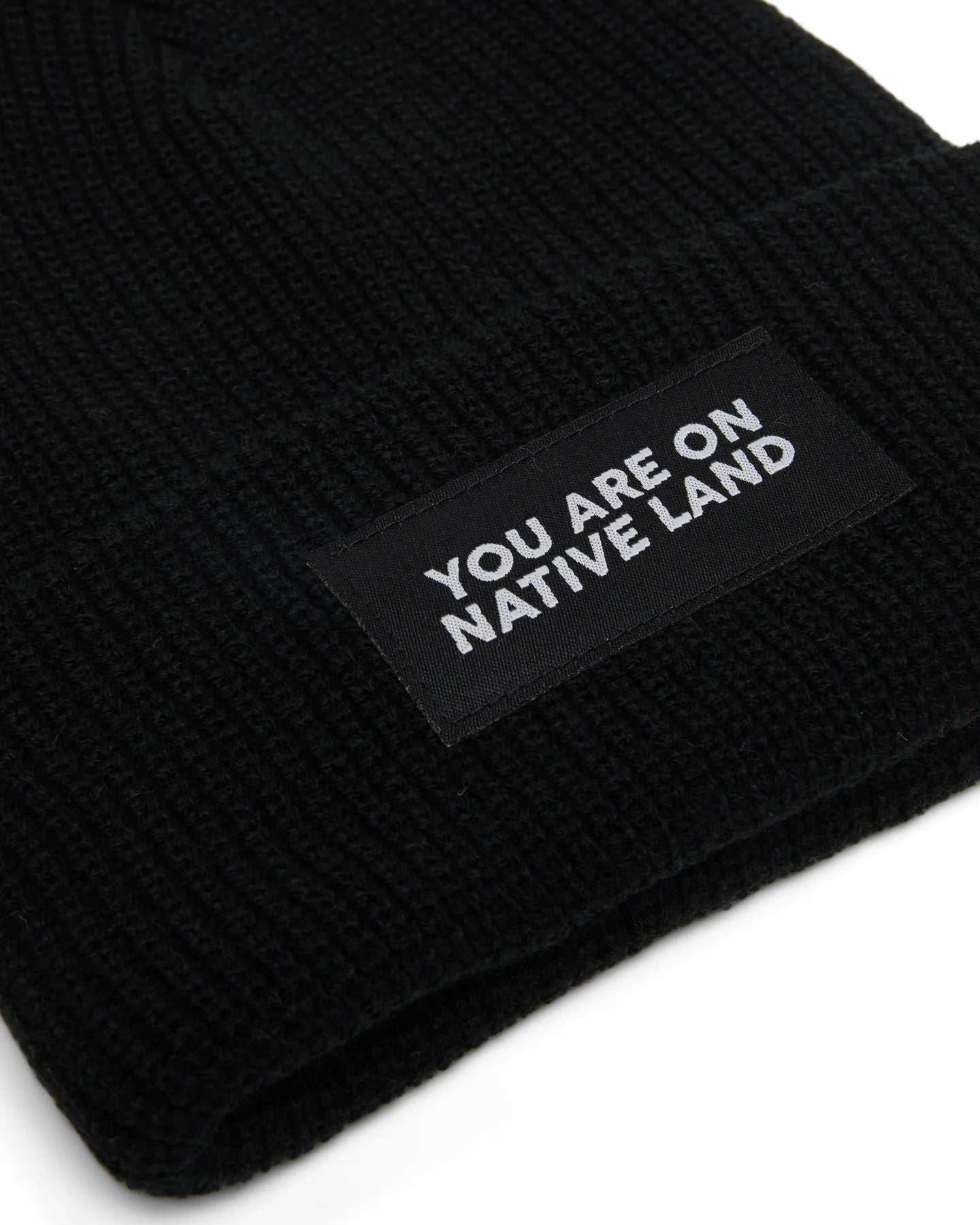 'YOU ARE ON NATIVE LAND' Ribbed Beanie